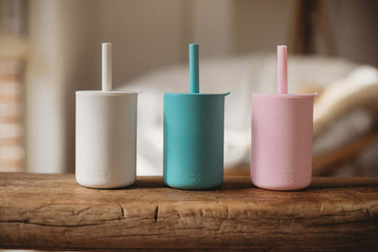 silicone sippy cup for kids in blue, pink and white
