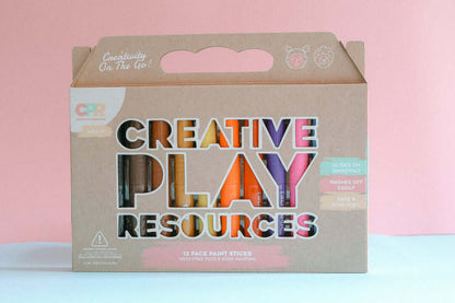 Box of 'Creative Play Resources' with colourful paint sticks