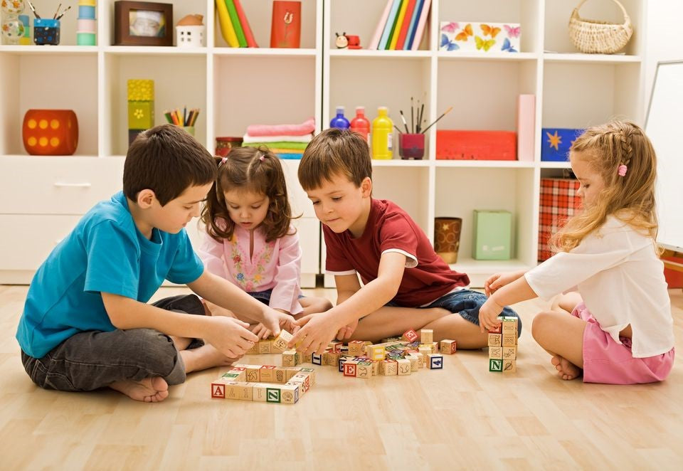 Children playing with wooden toys from Creative Learning Resources