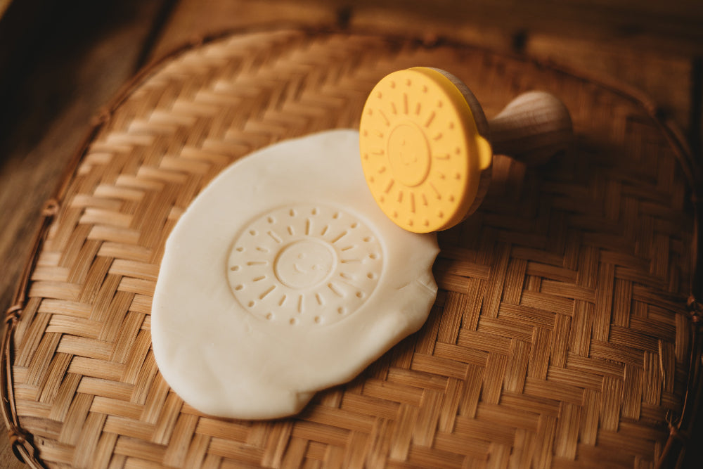 Close-up of interchangeable silicone weather stamps: sun