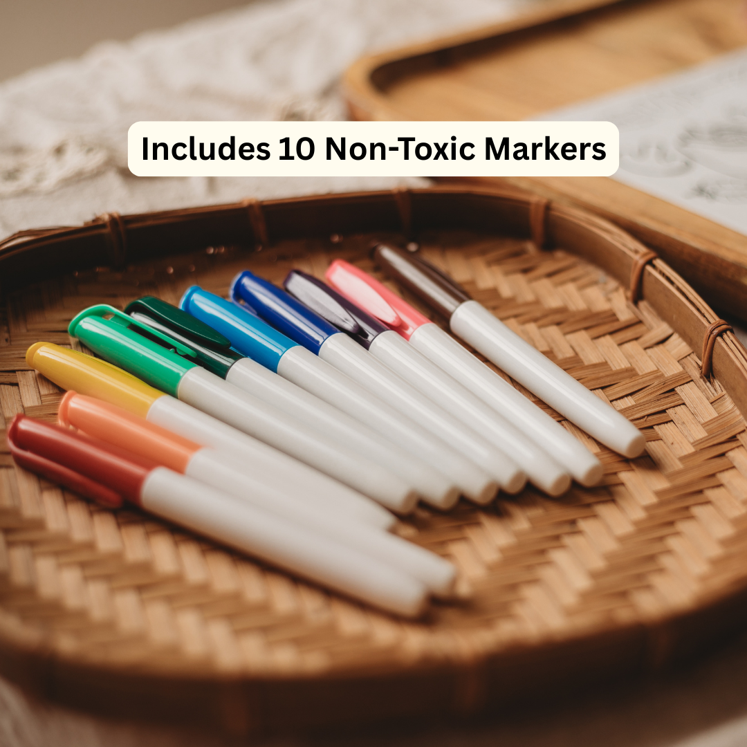 Ten non-toxic markers with white barrels and assorted cap colors, arranged on a woven bamboo tray. A text overlay at the top reads 'Includes 10 Non-Toxic Markers'.